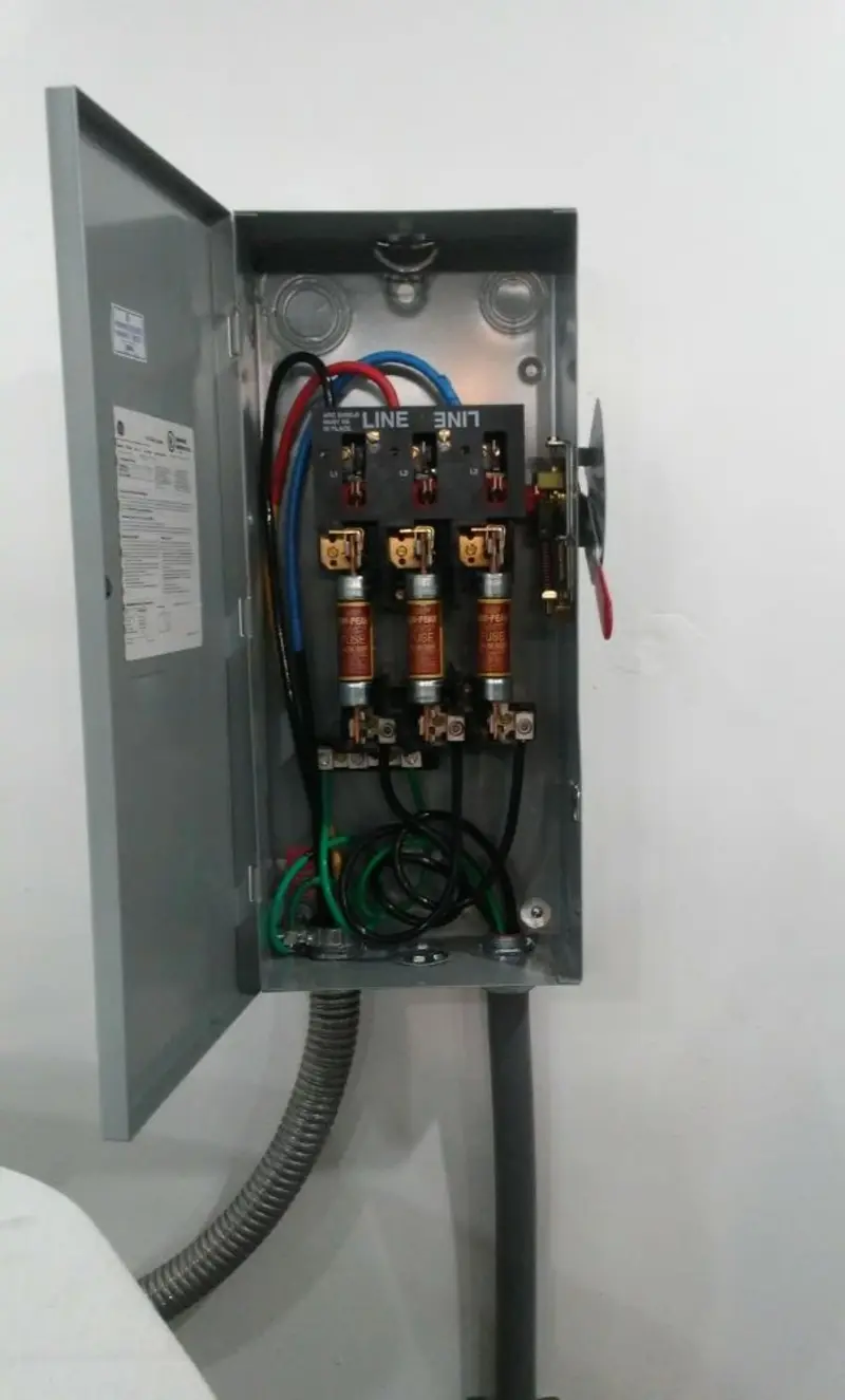 Three-phase disconnect switch installed for Smoke Detector Installation in Rollin
